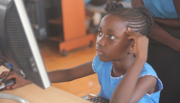 Kid in front of a computer