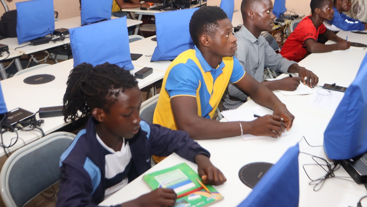 (c) Develop Africa. Boys in Develop Africa Sierra Leone Lab in a mentoring class organized by Develop Africa.