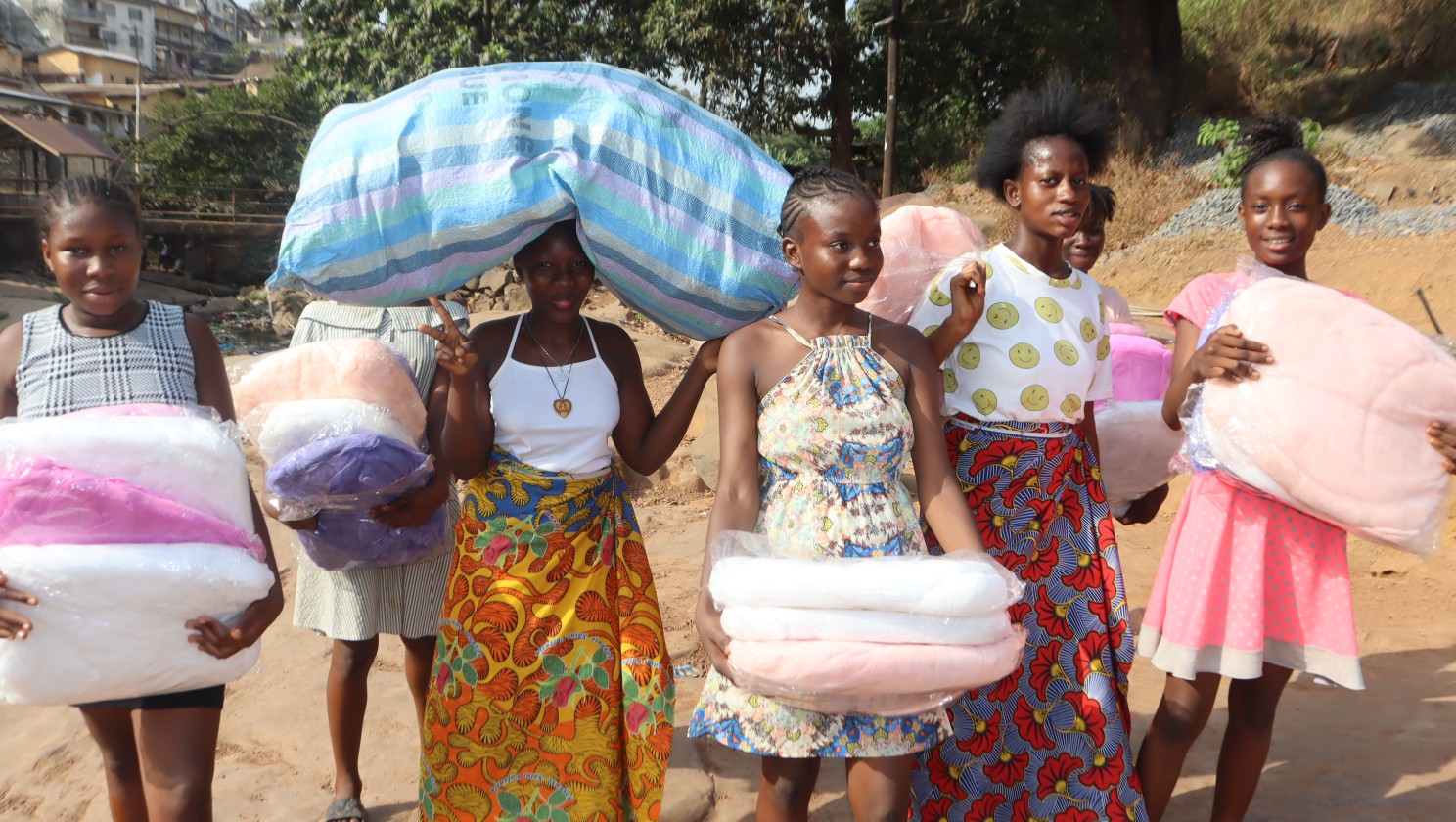 (c) Develop Africa. Packs of mosquito net distributed to the people by Develop Africa.