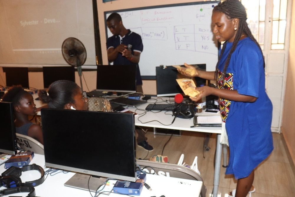 (c) Develop Africa. Staffs of Develop Africa in Sierra Leone teaching skills empowerment.