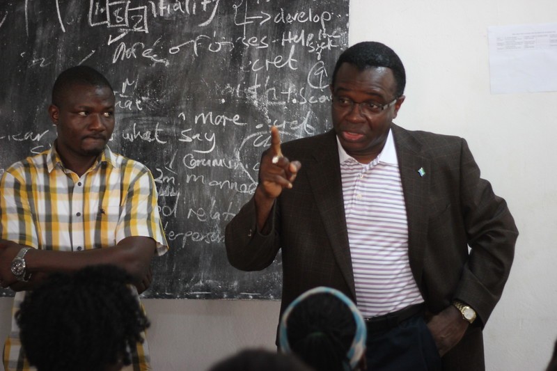 Harold, a volunteer providing a motivational talk to Develop Africa students.