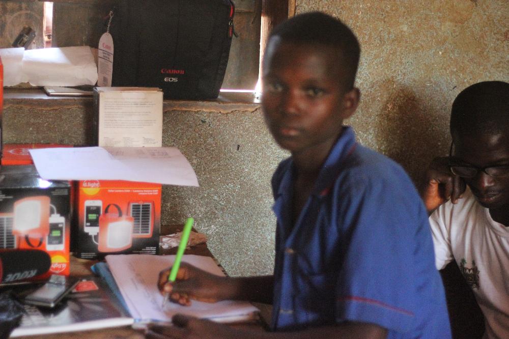 a-kid-in-kamawornie-with-solar-light