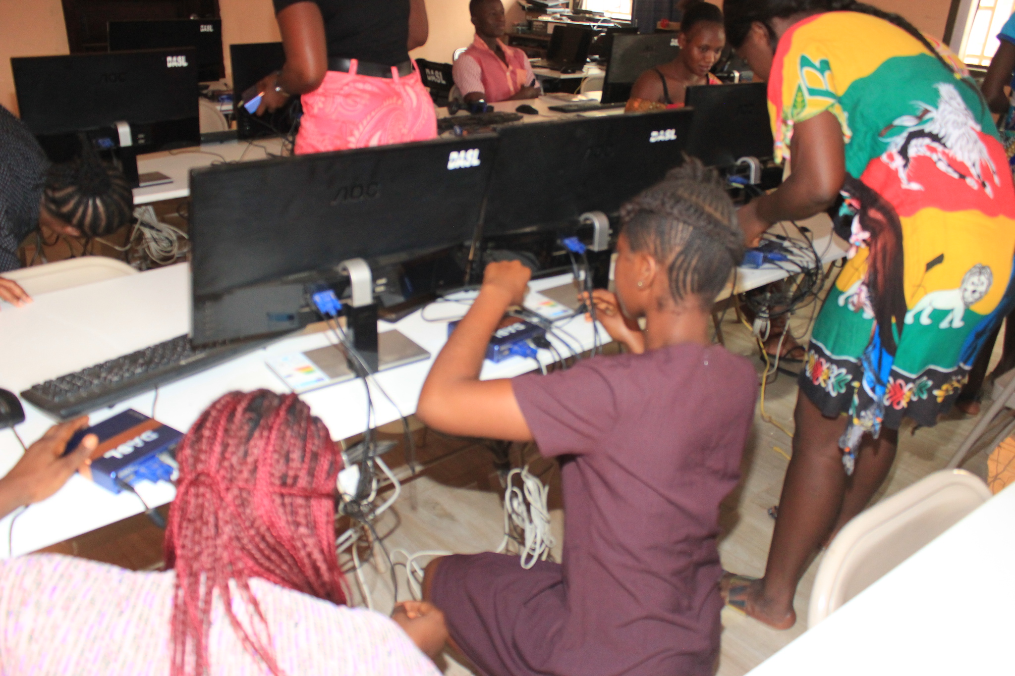 students-in-a-computer-lab-learning-to-coiple-computer-parts-toget-it-working.jpg